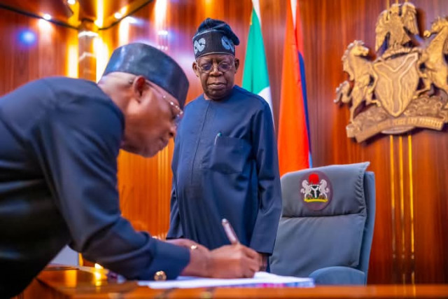 President Bola Ahmed Tinubu and Vice  Admiral Ibok-Ete Ibas (Rtd)
