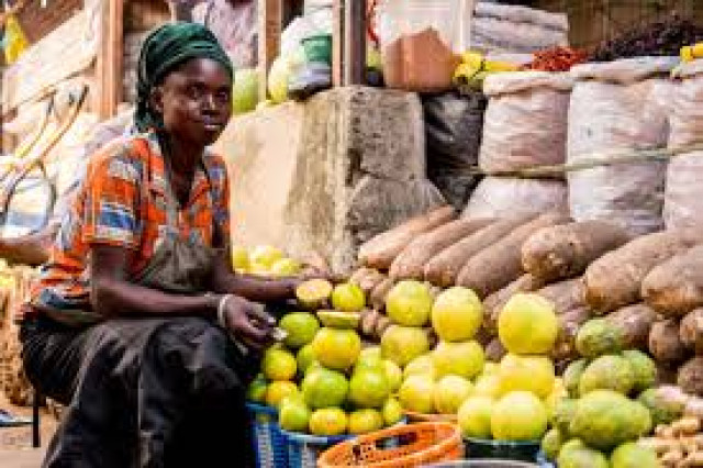 A Market Woman and her Goods