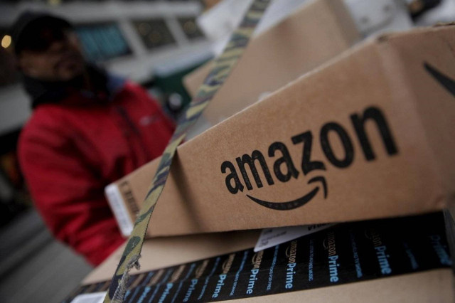 Amazon boxes are seen stacked for delivery in the Manhattan borough of New York City, January 29, 2016