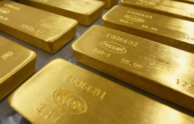 Percent pure gold are placed in a cart at the Krastsvetmet non-ferrous metals plant in the Siberian city of Krasnoyarsk, Russia March 10, 2022