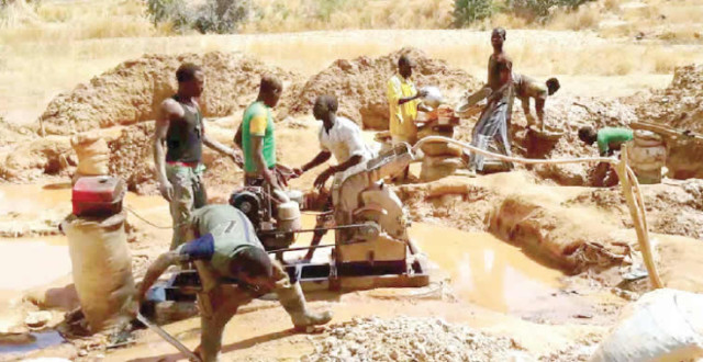 Photo of Labourers at the Mining site