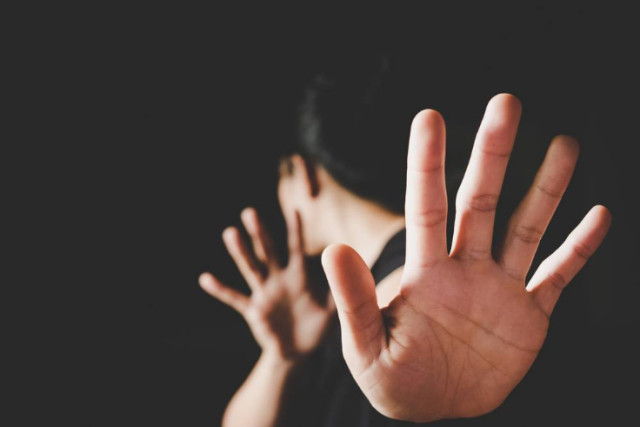 Photo illustration of Harassment